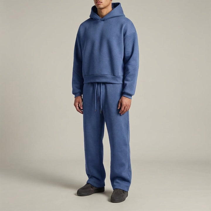 Detail of the hoodie drawstring and pocket on a men's Marlin warm leisure suit, trendy sportswear.