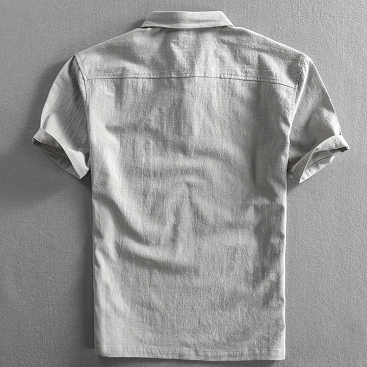 New Arrival: Men's Massimo Essential Polo. Breathable short-sleeve shirt with a relaxed fit for ultimate summer comfort.