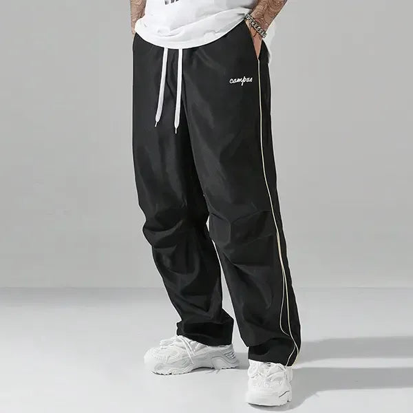 Men's Matera track pants in a modern relaxed fit with drawstring, perfect for casual, athletic, or loungewear comfort.