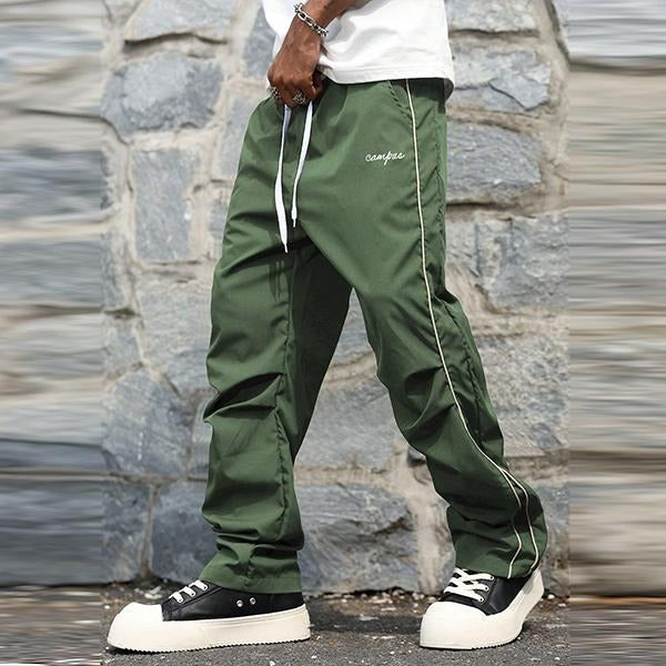 Comfortable & versatile men's Matera track pants, great for athletic activities, casual wear, or modern streetwear style.
