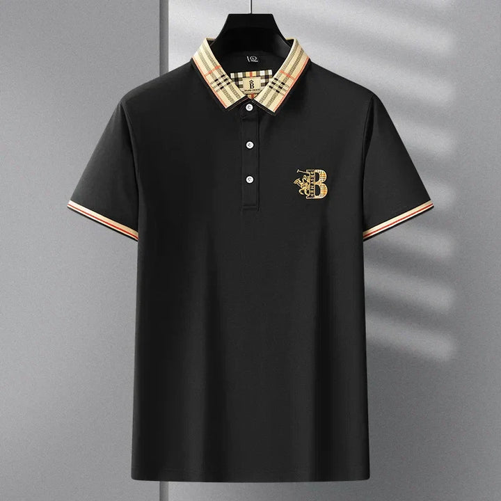 Men's short-sleeve polo, regular fit, with embroidered detail. An essential wardrobe staple for casual style.