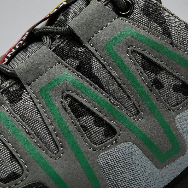 Close-up of men's Maxwell rugged hiking boots, showcasing sturdy laces and waterproof material