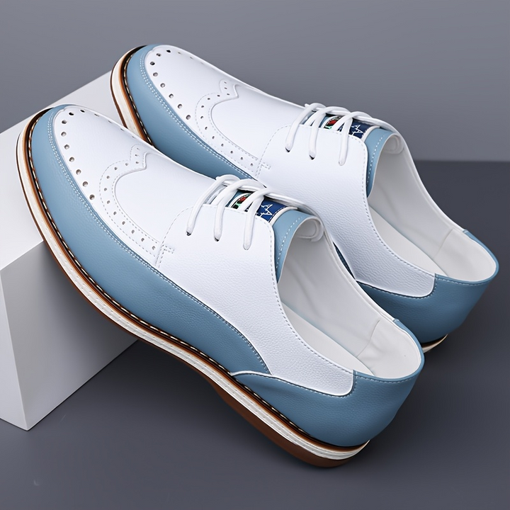 Men's classic brogue shoes with stylish detailing & all-day comfort, suitable for formal & casual.