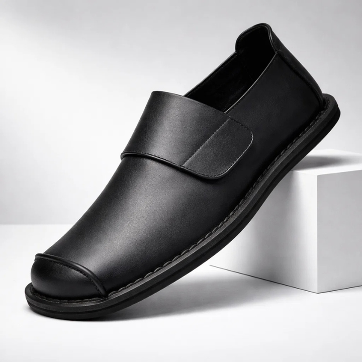 Classic Mayfair men's leather slip-on loafers, offering timeless style & easy comfort for daily fashion.