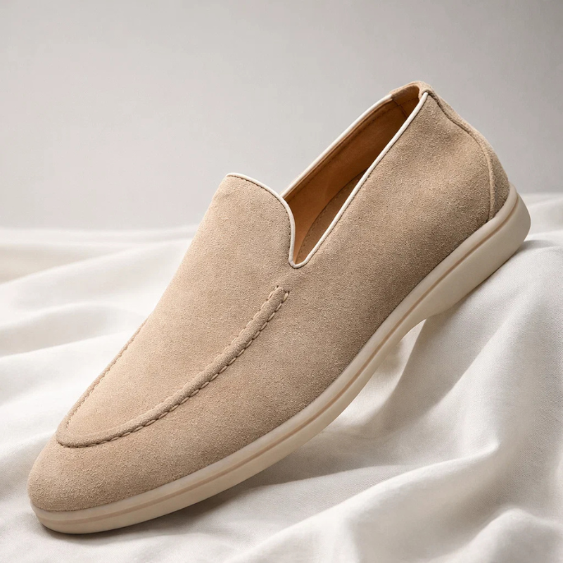 Man wearing Mayfair slip-on loafers, showcasing versatile men's fashion & comfortable casual footwear.