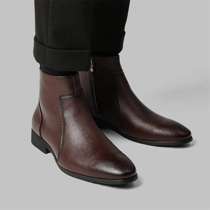 Sophisticated men's black zip ankle boots for a sharp, polished business or evening attire.