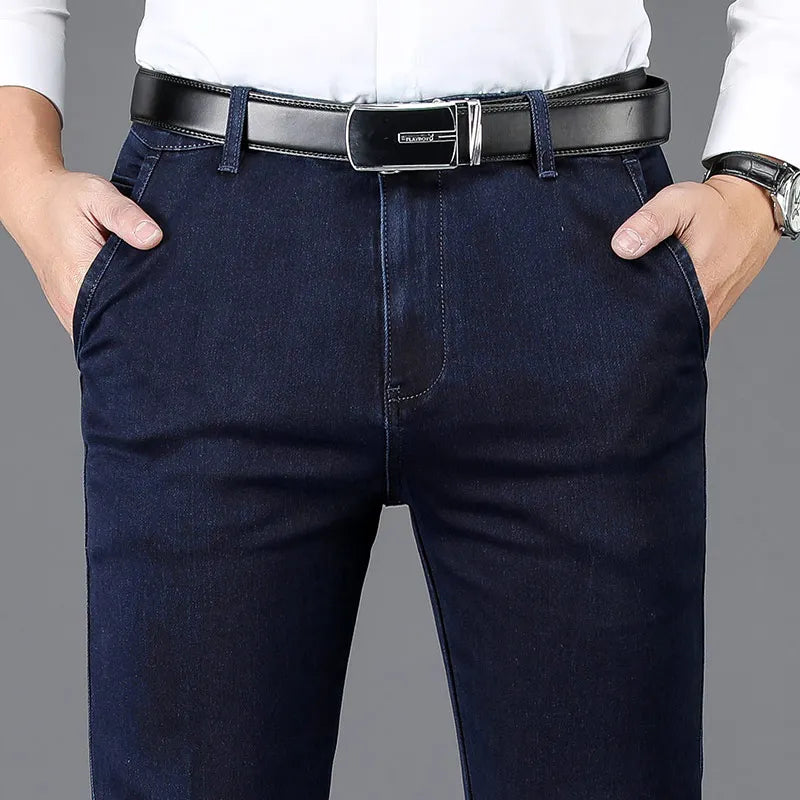 Dark gray men's slim fit stretch denim pants, versatile for casual & business casual.