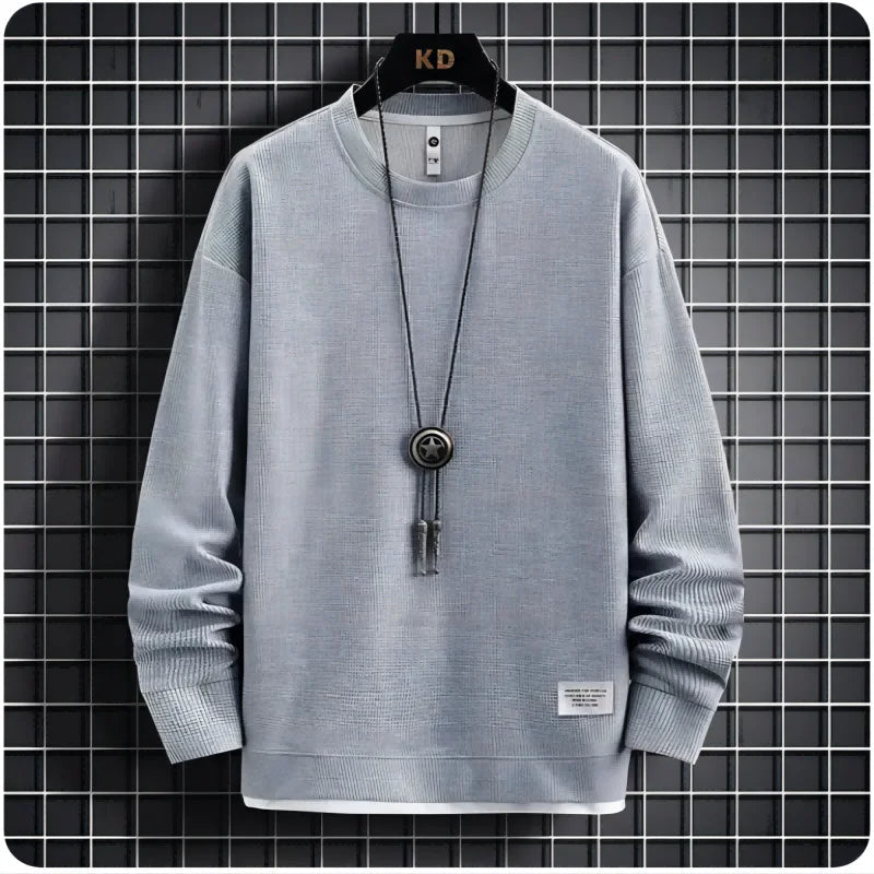Menswear relaxed fit lounge set with joggers and a comfortable sweater. Stylish two-piece casual tracksuit.