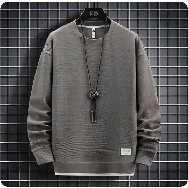 Super soft men's lounge set. Relaxed fit sweater and joggers ensure ultimate comfort and style.