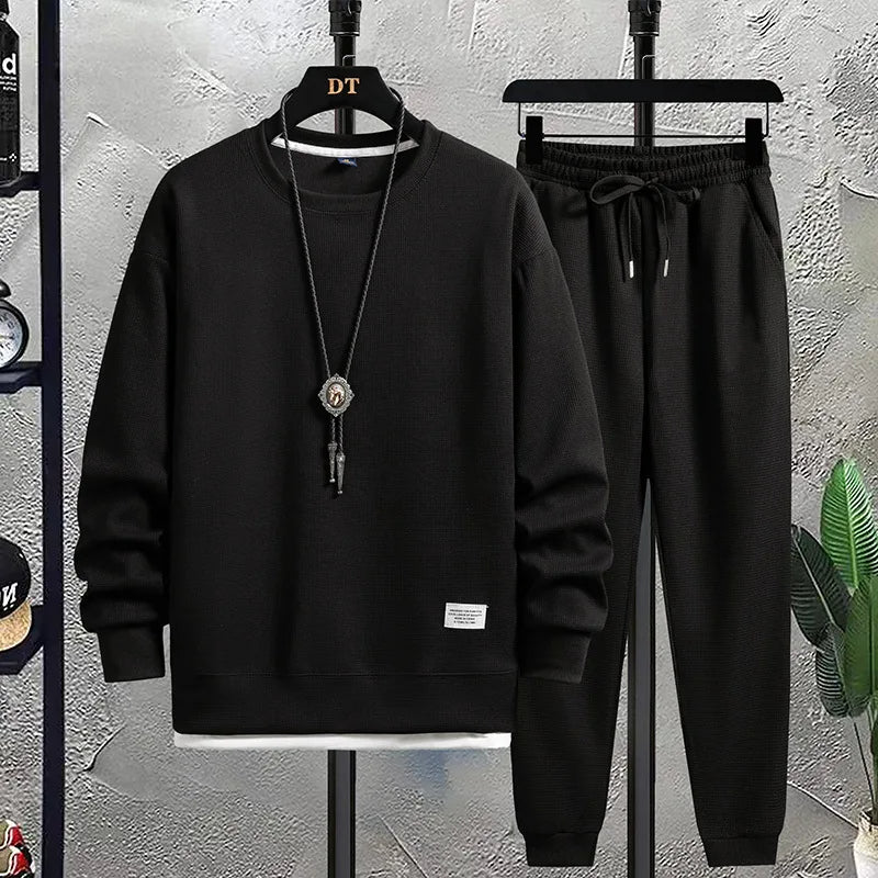 Cozy men's two-piece lounge set. Relaxed fit sweater & joggers designed for maximum comfort and style.