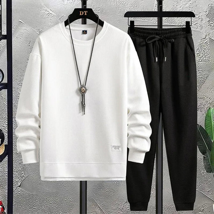 Premium men's casual wear lounge set. Stylish relaxed fit tracksuit with a cozy sweater & joggers.