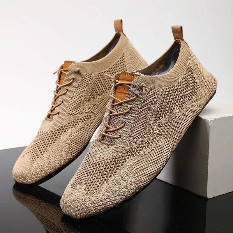 Top view of men's breathable knit slip-on sneakers, designed for everyday lightweight comfort.