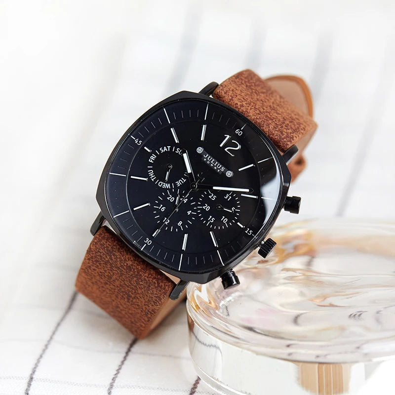 Midnight Eclipse men's chronograph watch featuring a dark blue dial and comfortable brown leather strap. Quartz movement.