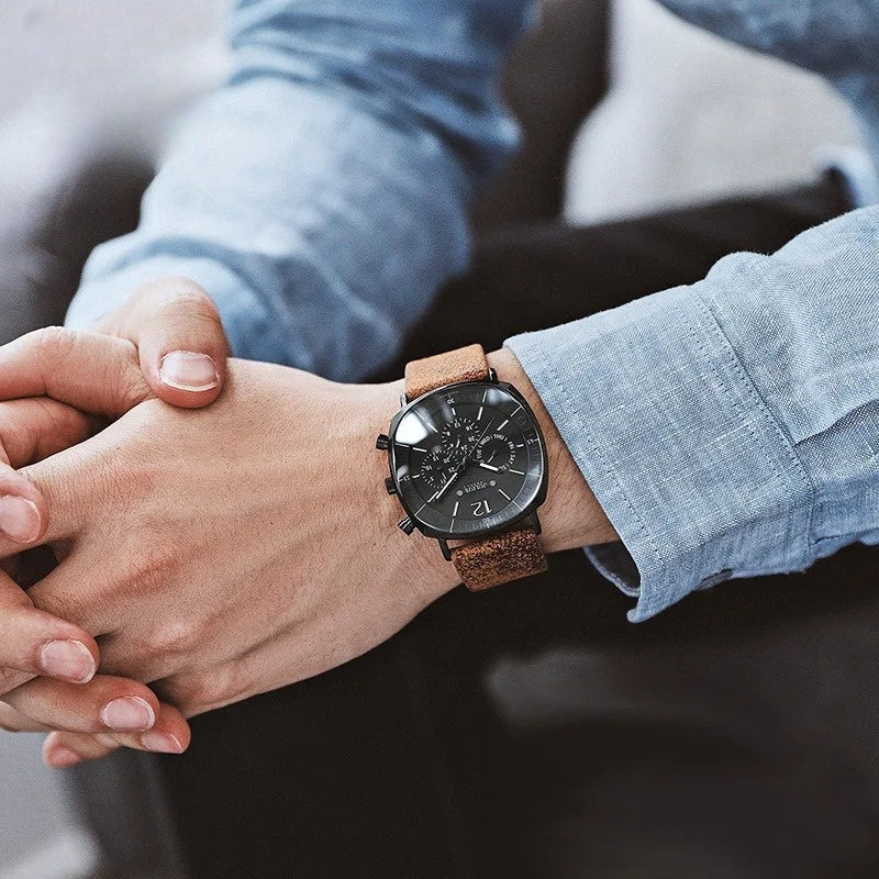 Sophisticated men's dress watch: Midnight Eclipse chronograph with elegant black dial & high-quality leather strap.