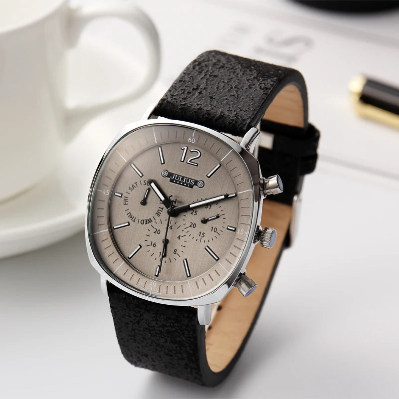 Sleek men's Midnight Eclipse chronograph watch. Dark aesthetic, black dial, multi-function display & leather band.