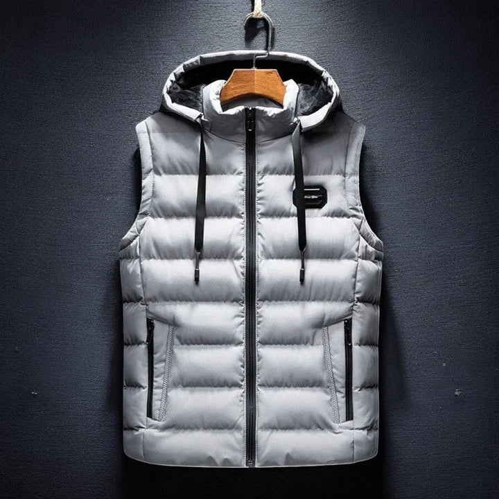 Comfortable men's hooded puffer vest for active athleisure & casual everyday style. Ideal lightweight fall/winter outerwear.