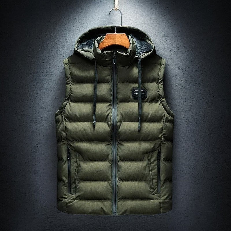 Lightweight, insulated men's puffer vest with hood. Great for fall/winter layering and everyday comfort as active outerwear.