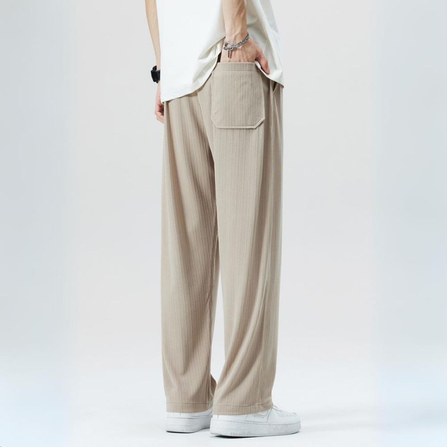 Khaki Milano pleated men's trousers. Features comfortable elastic waist & modern pleats, great for casual wear.