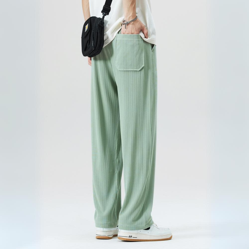 Fashionable men's Milano pleated trousers. Modern cut with an elastic waist, blending style & comfort.
