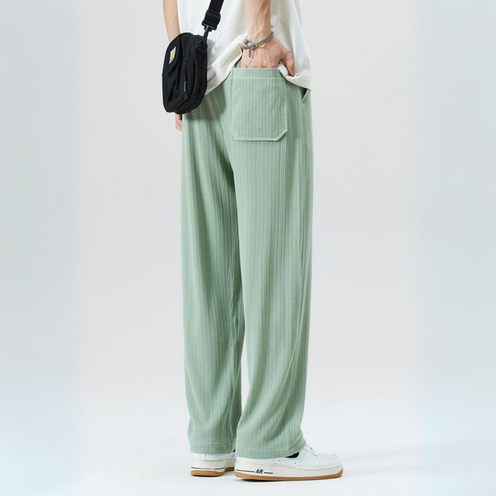 Fashionable men's Milano pleated trousers. Modern cut with an elastic waist, blending style & comfort.