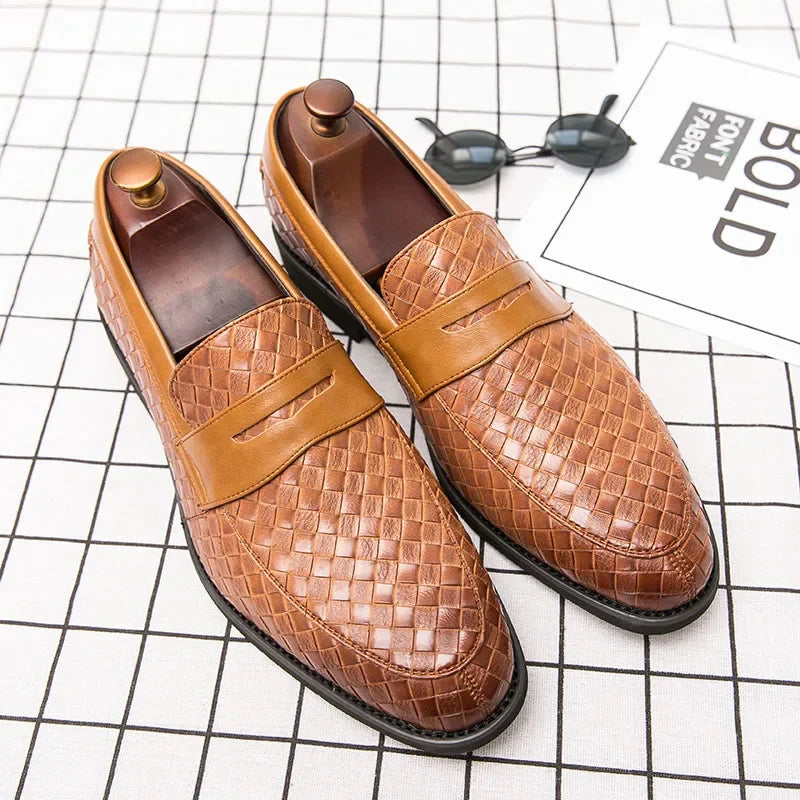 Close-up of stylish men's woven loafers with intricate texture, ideal for casual and dressy outfits.
