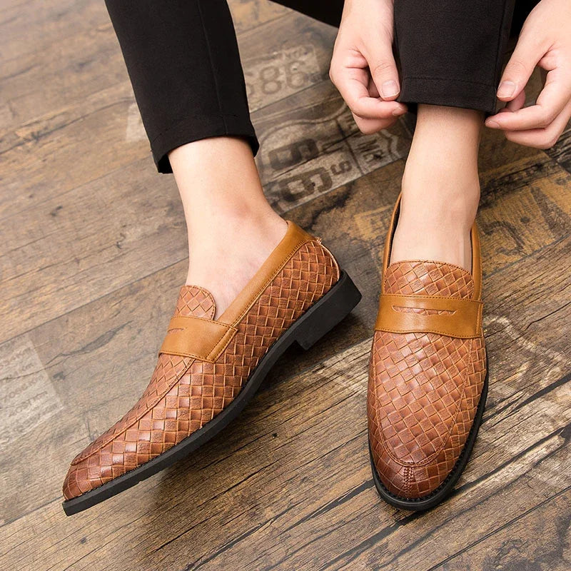 Stylish men's woven slip-on shoes with a sleek design, perfect for a refined casual or business look.