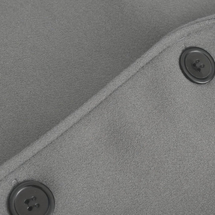 Side view of an elegant men's minimalist button winter coat, a modern smart casual trench.