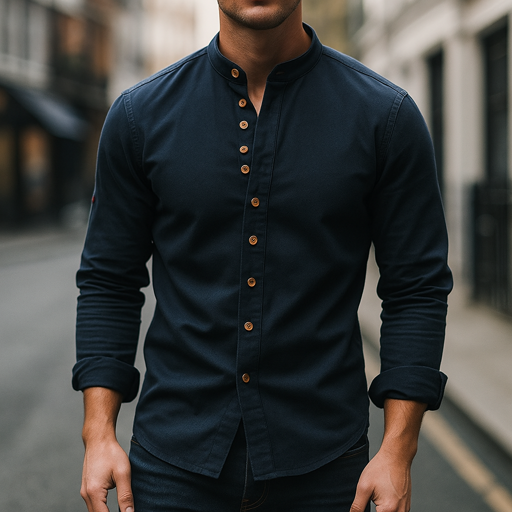 Close-up: minimalist light gray men's band collar shirt, highlighting the unique neck design & soft fabric.