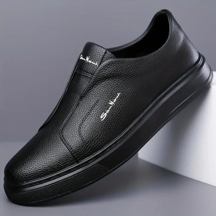 Everyday walking shoes: men's cushioned slip-on sneakers. Minimalist design delivers superior comfort.