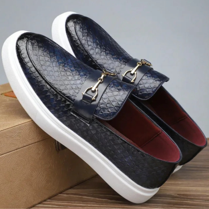 Men's modern navy slip-on loafers, perfect for adding a touch of sophisticated casual style.
