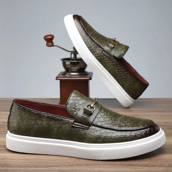 Elegant men's cherry brown slip-on loafers, a modern and comfortable choice for various outfits.
