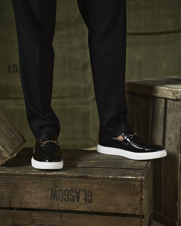 Versatile men's slip-on loafers, suitable as dress shoes or casual footwear with modern style.