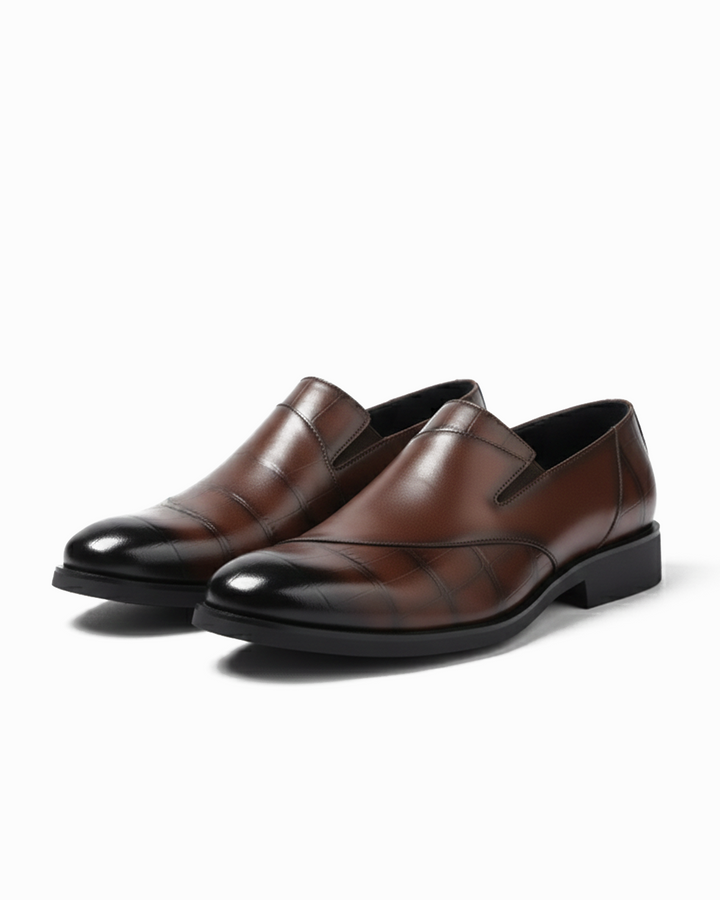 Men's modern black slip-on loafers, perfect for refined style & comfortable all-day wear.