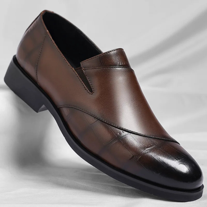 Brown men's classic slip-on loafers, offering elegant style, urban comfort & modern fashion.