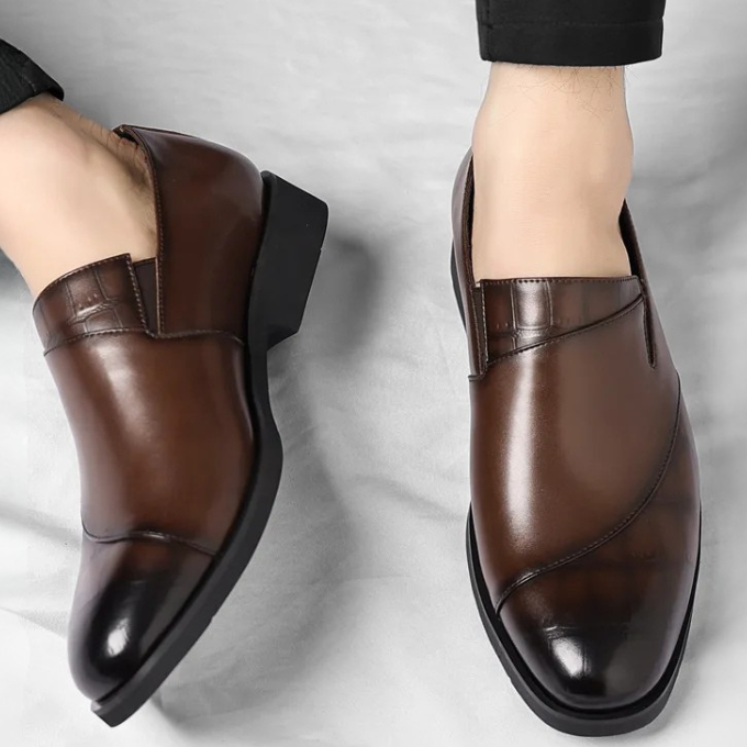 Sleek men's slip-on loafers, enhancing refined style, modern fashion & comfortable urban footwear.