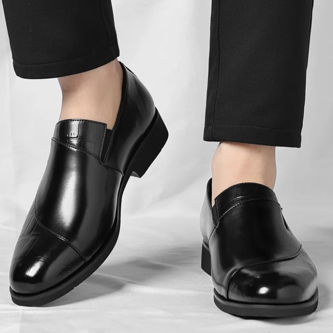 Refined men's slip-on loafers, embodying modern men's fashion and sophisticated formal footwear.