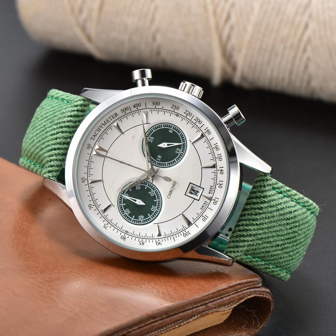 Modern men's stainless steel chronograph watch with a comfortable canvas strap. A sleek and versatile timepiece.