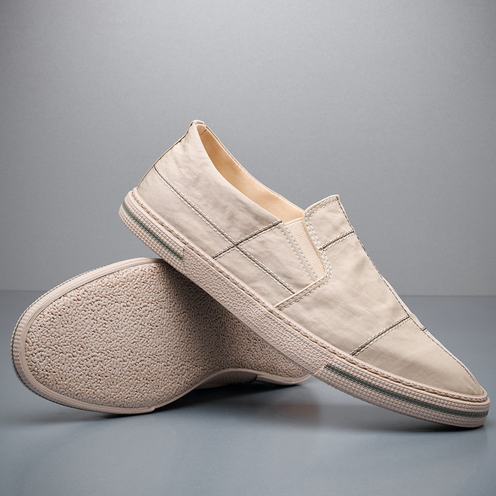 Lightweight men's slip-on shoes in a modern style, offering easy wear and all-day comfort for casual outings.
