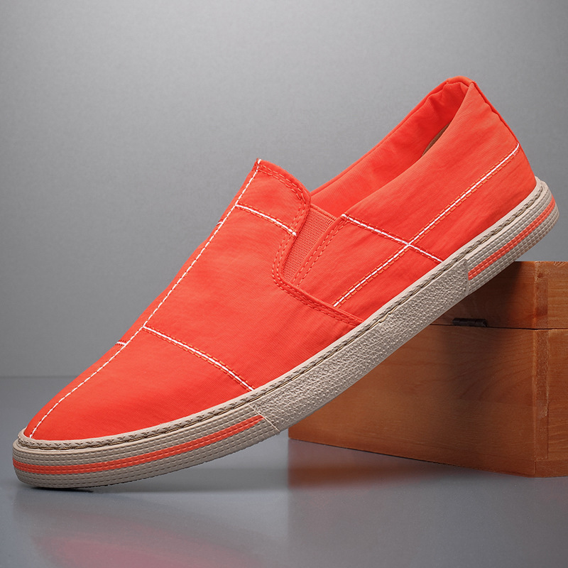Modern comfort men's slip-ons, designed for easy wear, breathability, and versatile casual style.