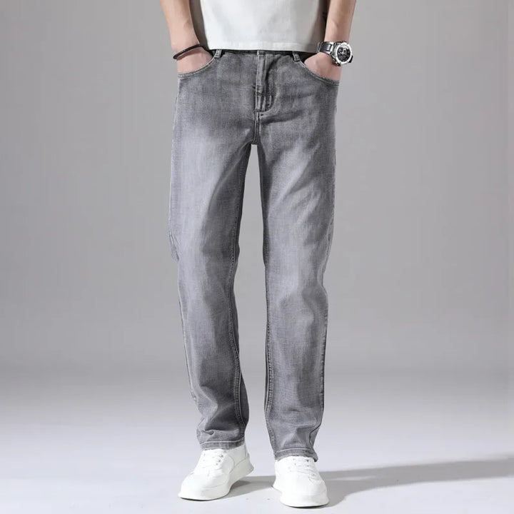 Stylish men's casual jeans with a modern fit, ideal as a versatile wardrobe staple for various outfits.