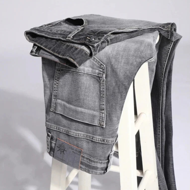 Classic men's modern fit jeans, offering a sleek silhouette and comfortable feel for contemporary style.