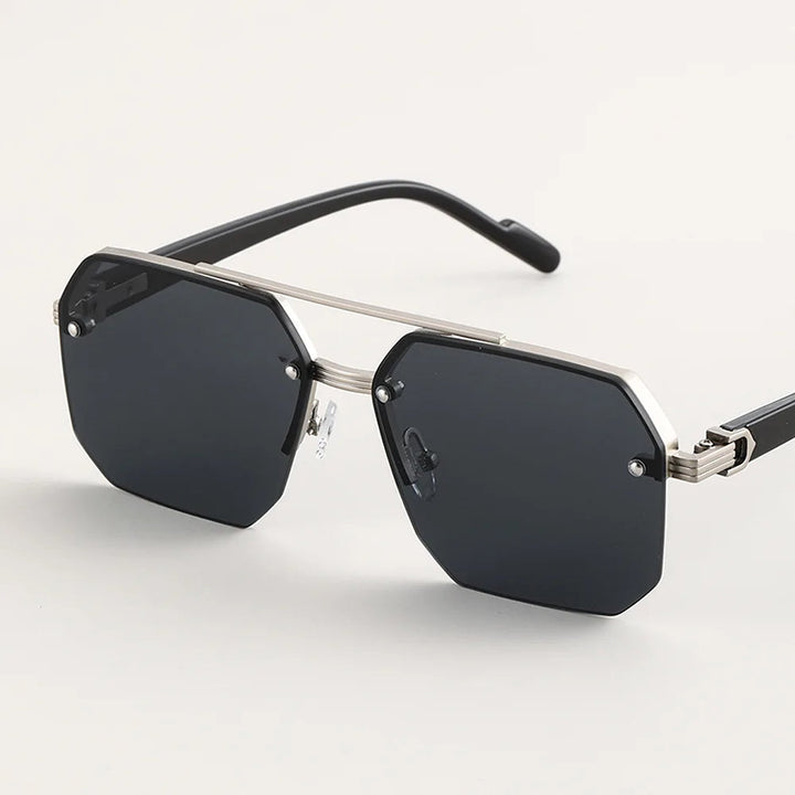 Stylish men's geometric sunglasses in sapphire blue. Polarized lenses offer UV protection and modern fashion eyewear.
