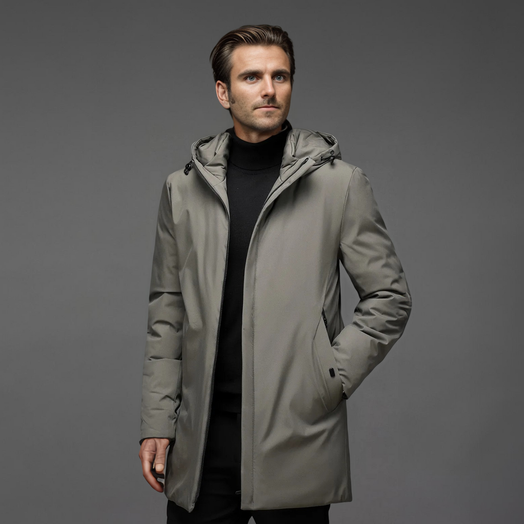 Man wearing a stylish modern hooded winter jacket, perfect for cold weather casual fashion.