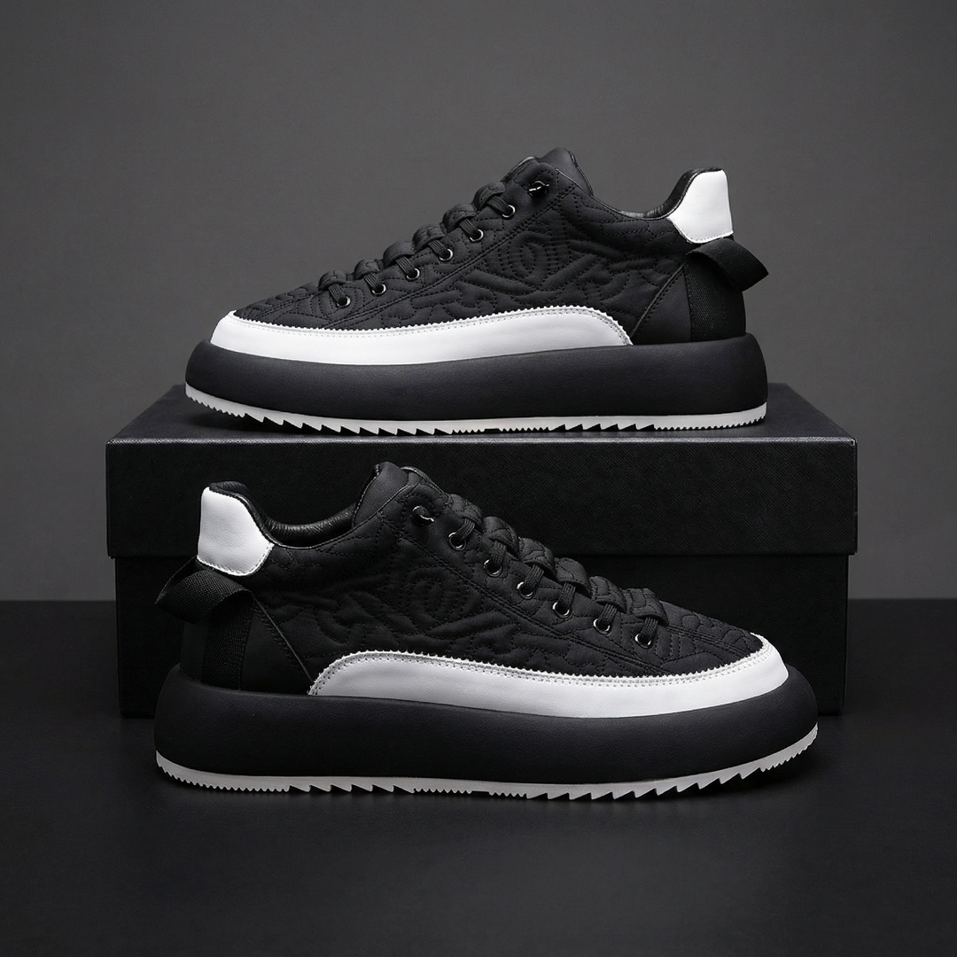 Comfortable men's lace-up sneakers with a modern aesthetic, perfect for active or casual outfits.