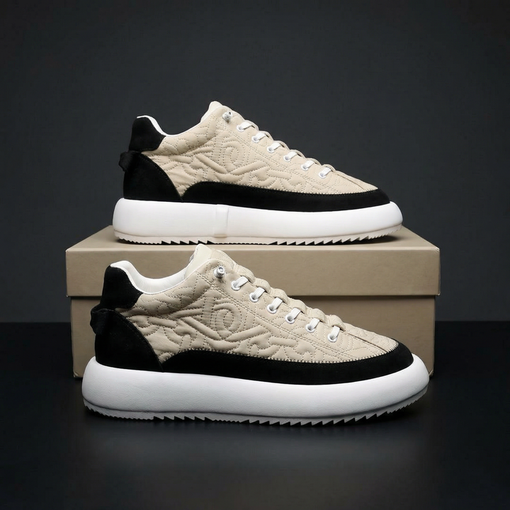 Stylish men's sneakers, showcasing modern design elements & promising all-day support.