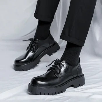 Stylish men's slip-on dress shoes, black low-top design with a comfortable thick sole for everyday wear.