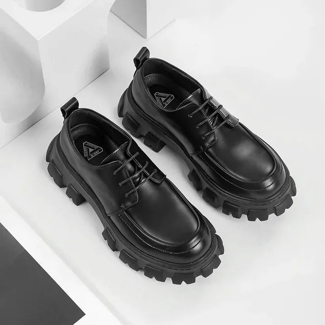Thick-soled men's dress shoes, low-top slip-on design, blending casual comfort with formal elegance.