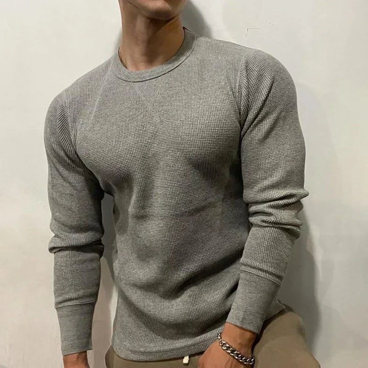 Men's modern muscle fit pullover sweater, slim tailored for autumn fashion. Perfect long sleeve for fall.