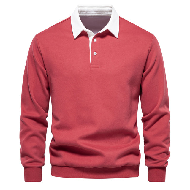 Close-up of men's polo pullover collar & fabric texture. Shows quality & refined casual style.