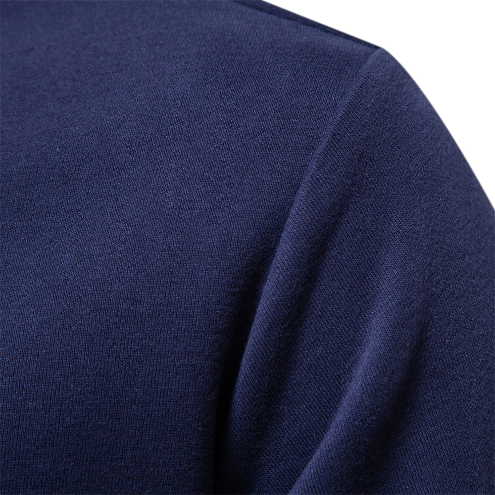 Man wearing a stylish long sleeve polo pullover. Perfect for sophisticated casual wear & comfort.